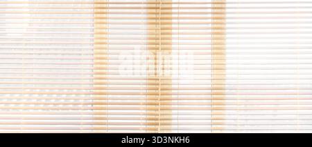 Big window with blinds in room Stock Photo