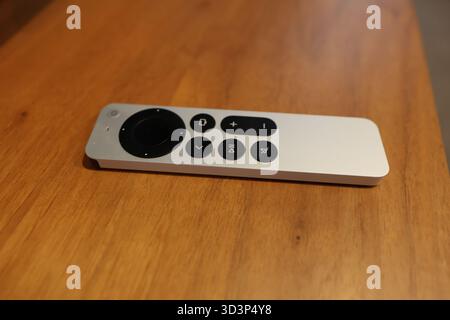 Modern remote control on wooden table Stock Photo
