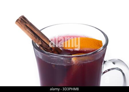 Mulled Wine with Orange and Cinnamon Sticks and Christmas decoration isolated on white background Stock Photo