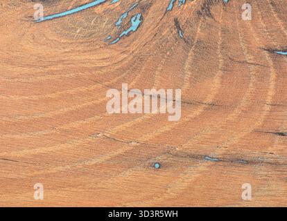 Cherry, aged natural wood texture with blue artificial veins, close-up. Background, texture. Stock Photo