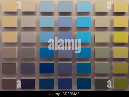 Color palette with blue yellow and green paint samples arranged in rows Stock Photo