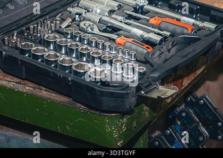 Tool set: screwdrivers, wrenches. Box with various tools, wrenches and screwdrivers. Tools organized in such way that it is easy to find what you need Stock Photo