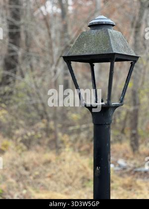 Single street vintage black metal lantern in a desolate environment Stock Photo