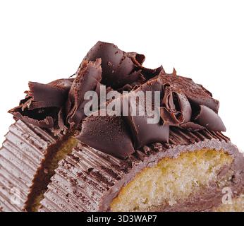 Food, Chocolate roll with cream on a white plate Stock Photo