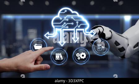 A futuristic concept illustrating a robotic hand and a human finger interacting with cloud computing icons in a sleek modern office environment Stock Photo