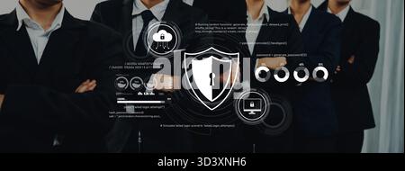A professional business team in suits stands confidently with a cybersecurity concept. The image features a shield icon and digital interface elements Stock Photo
