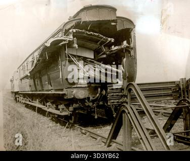 This 1913 image shows a wrecked railroad car on the Toledo & Ohio ...