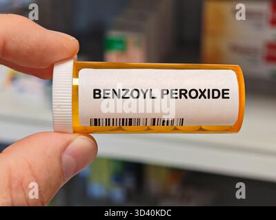 Box of BENZOYL PEROXIDE tablets on a hospital pharmacy table used to ...
