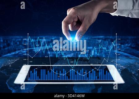 A hand interacts with a futuristic digital graph displayed on a tablet, symbolizing advanced data analytics and technology in finance and business Stock Photo