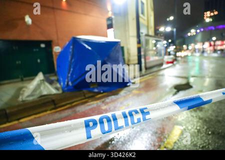 Smallbrook Queensway, Birmingham, Nov 8th 2025 - West Midlands Police closed a section of road directly outside Birmingham's Bullring shopping centre and New Street Station after a woman was stabbed in the neck on Friday evening, a man in his 20's has been arrested. Several forensic tents were erected close to a bus stop. Two small silver tents and a large blue evidential tent were placed on the pavement around a small cordon that closed the road off. Two police officers remained at the scene throughout the night. West Midlands Police Statement: A man is in custody after a stabbing in Birmingh Stock Photo