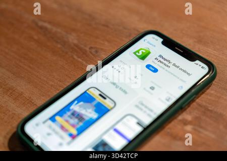 Shopify mobile application in App Store on screen of smartphone: Serbia, Novi Sad - 08 November 2025 Stock Photo