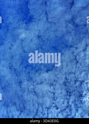 High clouds against a blue sky Stock Photo