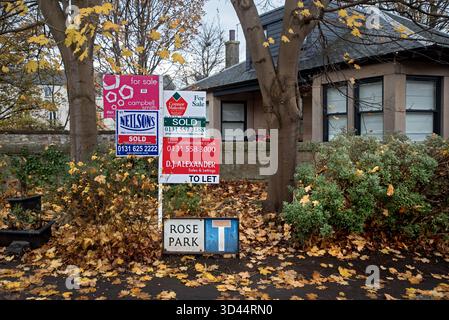 Estate Agents signs displayed in Trinity, EdinburghScotland, UK. Stock Photo