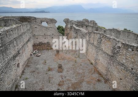 Ruins In The Grottoes Of Catullus At Lake Garda In Sirmione Italy On A Wonderful Sunny Autumn Day With A Few Clouds In The Sky Stock Photo