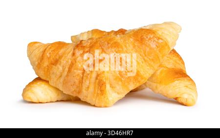 Side view of three brown or golden croissants in stack is isolated on white background with clipping path. Stock Photo