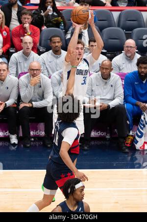 Dallas Mavericks forward Cooper Flagg warms up before an NBA basketball