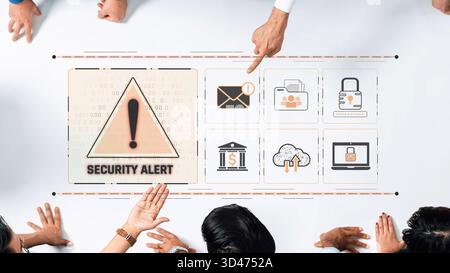 A diverse group of professionals engages in discussion around a security alert displayed on a table, highlighting crucial aspects of digital safety Stock Photo