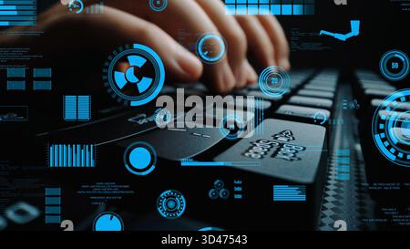 Hands are actively typing on a laptop keyboard, surrounded by a dynamic digital data overlay, emphasizing modern technology and innovation in a sleek Stock Photo