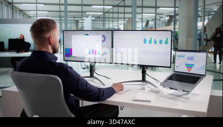 Man Analyzing Market Data On Performance Dashboard For Predictive Business Stock Photo