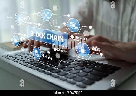 A focused view on a laptop computer displaying blockchain technology concepts, including network security and data protection, illustrating modern Stock Photo
