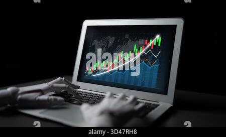 A robotic hand interacts with a laptop screen displaying a vibrant financial growth chart, emphasizing modern technology in trading and data analysis Stock Photo