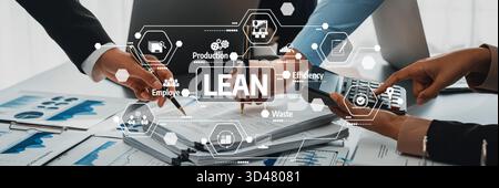Collaboration on Lean Management Strategies to Enhance Productivity and Reduce Waste with Digital Tools and Hands-on Engagement in a Modern Office Stock Photo