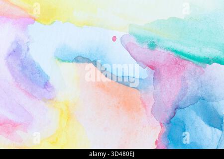 Macro close-up of an abstract colorful watercolor gradient fill background with watercolour stains. Full frame textured paper background, copy space. Stock Photo