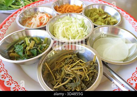 Assorted of Boiled, Pickled and Fresh Vegetables, a Side Dish of Hot and Spicy Khanom Jeen Nam Ya Enjoyed Widely in Thailand Stock Photo