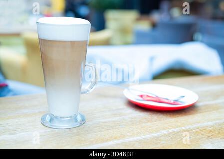 aromatic latte coffee in a glass at a restaurant Stock Photo