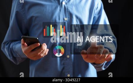 Man using a mobile phone and touching a holographic interface displaying AI agents, data charts, and innovative ideas Stock Photo