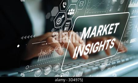 Hands typing on keyboard with digital interface showing market insights and analytical data trends in business environment. Asymptotic smart data Stock Photo