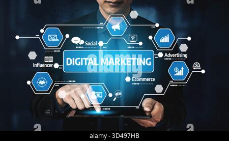 A business professional interacts with a tablet displaying digital marketing concepts on a high-tech interface, highlighting various aspects of modern Stock Photo
