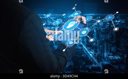 A businessman holds a tablet displaying a digital interface among a city skyline, symbolizing modern technology, connectivity, and innovation in the Stock Photo