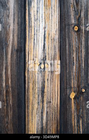 Rustic wooden board, Aged timber with textured finish, Weathered oak slabs ideal for decor, Timeworn wooden planks featuring natural knots and muted Stock Photo