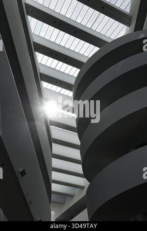 ARoS Aarhus art museum, distinctive, sculptural spiral staircase, modern architecture, incidence of light, sunbeams, interior view, monochrome, Aarhus Stock Photo