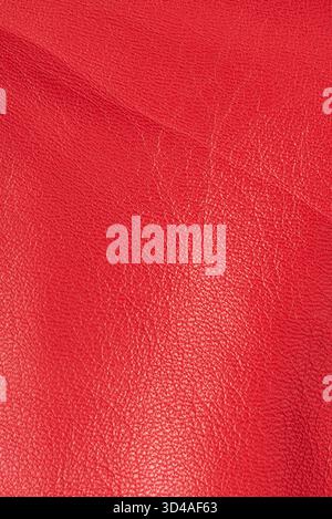 Natural leather dyed red macro photo as a background Stock Photo