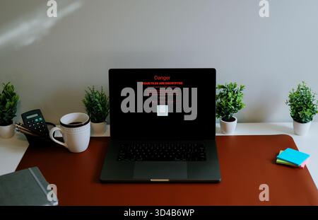 Middle Aged Executive Man Working From Home Falls Victim to Spear Phishing Ransomware Attack - Common Cybersecurity Scenario Concept Stock Photo