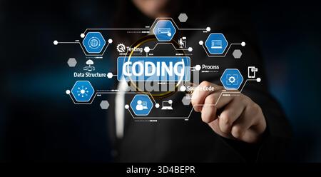A young programmer interacts with visual representation of coding concepts and data structures in a modern digital workspace, showcasing innovation Stock Photo