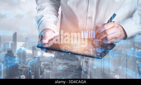Professional engaged in data analysis using a digital tablet with futuristic interface overlays, showcasing innovation against a vibrant urban skyline Stock Photo