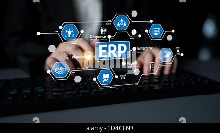 A modern business person interacts with a digital ERP interface, emphasizing the integration of enterprise management and technology in dynamic Stock Photo