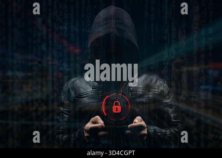 Close up to a faceless hooded hacker man with a mobile pone in his hands with an unlock padlock and a code concept Stock Photo