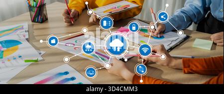 A dynamic scene depicting a collaborative work environment where a team engages in cloud computing concepts with colorful data visualizations and Stock Photo