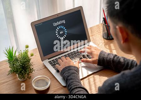 Software update on computer for modish version of device software upgrade Stock Photo