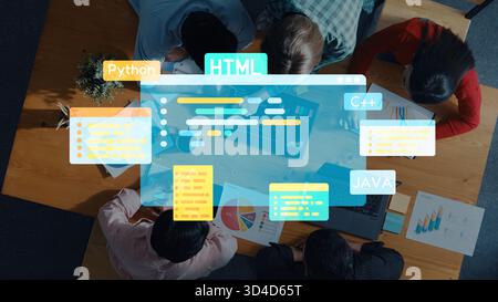 A diverse team of programmers collaborates in a modern workspace, utilizing various coding languages for software development, brainstorming ideas Stock Photo
