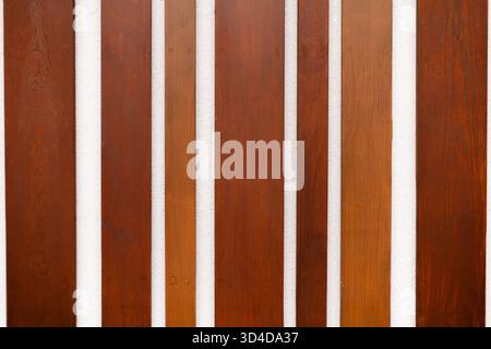 Wooden wall with vertical panels in different shades. High quality photo Stock Photo