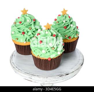 Christmas tree shaped cupcakes isolated on white Stock Photo