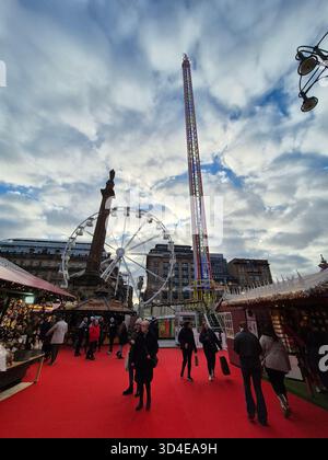 Christmas at Glasgow, Scotland. People walking around at Christmas Market at George Square in Glasgow Stock Photo