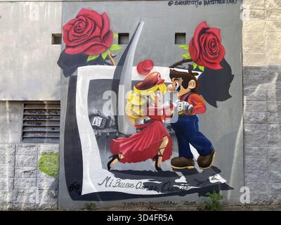 Street art mural in Buenos Aires with a comic couple dancing tango and the inscription mi buenos aires querido, my beloved Buenos Aires, Argentina Stock Photo