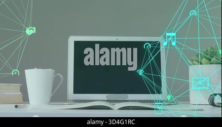 Showing centered laptop resting on white tabletop with open book, coffee mug, teal overlay Stock Photo