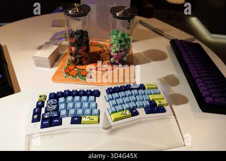 Berlin, Germany - September 09, 2025: IFA.Berlin. Custom mechanical keyboard features vibrant keycaps and unique design elements on a tabletop Stock Photo